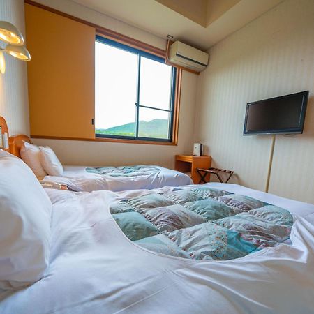 Hotel Yawaragi-No-Sato Yadoya Yufu Habitación foto